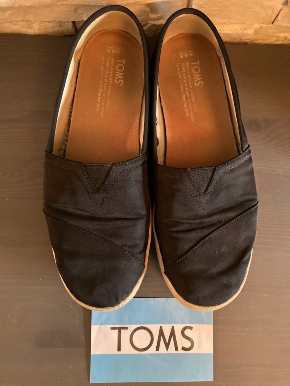 TOMS Classic Black Slip‑Ons – Women’s 8.5
